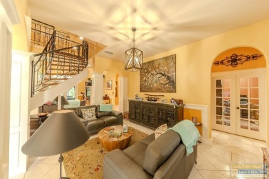 Tucked along the fairway in Rancho Escondido, this 4,037 sq ft on Rancho Viejo Resort and Country Club in Texas - for sale on GolfHomes.com, golf home, golf lot