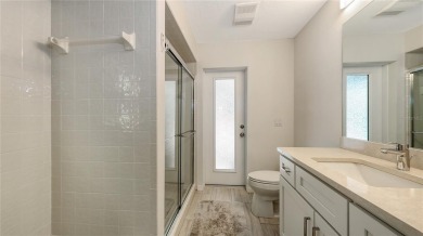 Tucked away among mature trees and lush landscaping, this on IMG Academies Golf and Country Club in Florida - for sale on GolfHomes.com, golf home, golf lot