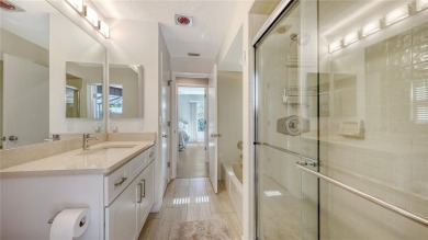 Tucked away among mature trees and lush landscaping, this on IMG Academies Golf and Country Club in Florida - for sale on GolfHomes.com, golf home, golf lot