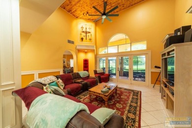 Tucked along the fairway in Rancho Escondido, this 4,037 sq ft on Rancho Viejo Resort and Country Club in Texas - for sale on GolfHomes.com, golf home, golf lot