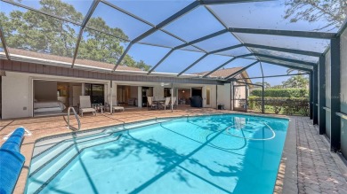 Tucked away among mature trees and lush landscaping, this on IMG Academies Golf and Country Club in Florida - for sale on GolfHomes.com, golf home, golf lot