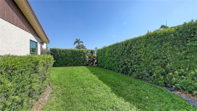 Tucked away among mature trees and lush landscaping, this on IMG Academies Golf and Country Club in Florida - for sale on GolfHomes.com, golf home, golf lot