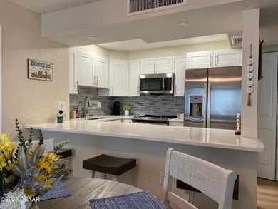 OCEANFRONT PARADISE AWAITS IN THIS BEAUTIFUL MOVE IN READY CONDO on Oceans Golf Club in Florida - for sale on GolfHomes.com, golf home, golf lot