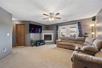 Enjoy top-floor privacy and peaceful views from this pristine on Quail Creek Golf Course in Iowa - for sale on GolfHomes.com, golf home, golf lot