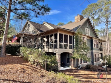 This gorgeous home in Reynolds Lake Oconee with sweeping views on Reynolds Lake Oconee - The National  in Georgia - for sale on GolfHomes.com, golf home, golf lot