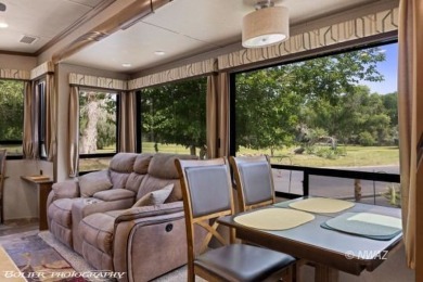 This unique property offers a stunning view lot situated on Beaver Dam Resort in Arizona - for sale on GolfHomes.com, golf home, golf lot