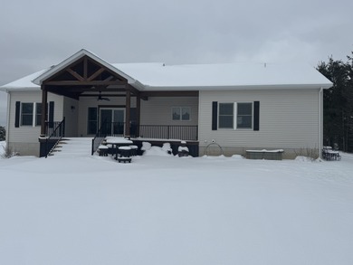 **Gorgeous Newer Build Overlooking Lakewood On The Green and on The Briar South At Lakewood in Michigan - for sale on GolfHomes.com, golf home, golf lot