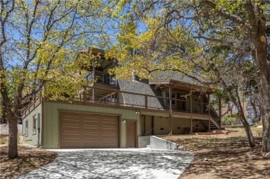 Nestled on a serene street in Moonridge, this charming Big Bear on Big Bear Mountain Ski and Golf Resort in California - for sale on GolfHomes.com, golf home, golf lot