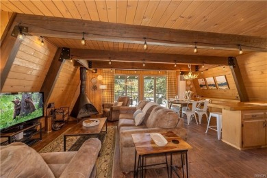 Nestled on a serene street in Moonridge, this charming Big Bear on Big Bear Mountain Ski and Golf Resort in California - for sale on GolfHomes.com, golf home, golf lot