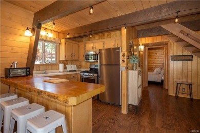 Nestled on a serene street in Moonridge, this charming Big Bear on Big Bear Mountain Ski and Golf Resort in California - for sale on GolfHomes.com, golf home, golf lot