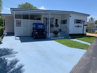 This 1200 square feet, 1.0 bed 1.5 bath Manufactured Home in the on Orangebrook Golf and Country Club in Florida - for sale on GolfHomes.com, golf home, golf lot