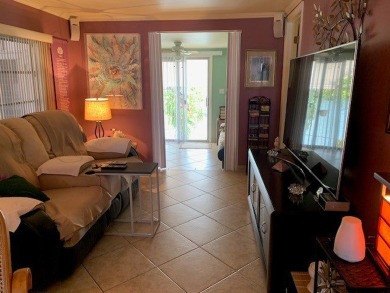 This 1200 square feet, 1.0 bed 1.5 bath Manufactured Home in the on Orangebrook Golf and Country Club in Florida - for sale on GolfHomes.com, golf home, golf lot