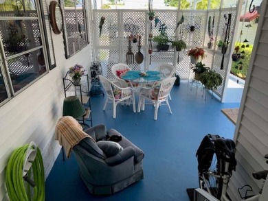 This 1200 square feet, 1.0 bed 1.5 bath Manufactured Home in the on Orangebrook Golf and Country Club in Florida - for sale on GolfHomes.com, golf home, golf lot