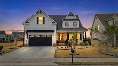 Stunning lakefront curb appeal meets timeless character in this on Myrtlewood Golf Course and Club  in South Carolina - for sale on GolfHomes.com, golf home, golf lot