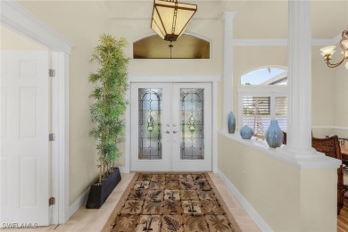 This home flows with charm, sunlight and lake views with privacy on Royal Tee Country Club in Florida - for sale on GolfHomes.com, golf home, golf lot