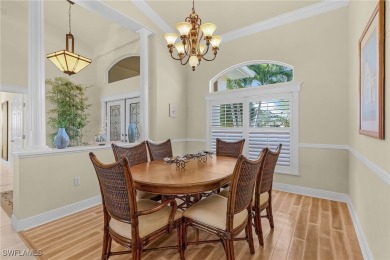 This home flows with charm, sunlight and lake views with privacy on Royal Tee Country Club in Florida - for sale on GolfHomes.com, golf home, golf lot