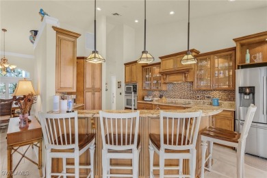 This home flows with charm, sunlight and lake views with privacy on Royal Tee Country Club in Florida - for sale on GolfHomes.com, golf home, golf lot