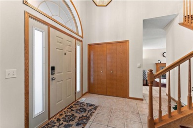 Sun-filled and magnificent, this impressive two-story on Eagle Valley Golf Course in Minnesota - for sale on GolfHomes.com, golf home, golf lot