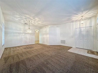 Home is a  St Andrews model located on a corner lot. A paver on Kings Ridge Golf Club in Florida - for sale on GolfHomes.com, golf home, golf lot