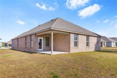 This stunning and like-new four-bedroom, three-bathroom home on The National Golf Club of Louisiana in Louisiana - for sale on GolfHomes.com, golf home, golf lot