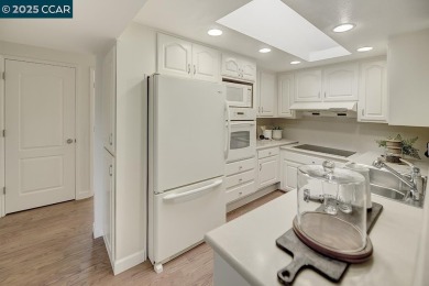 Charming 2BR/1BA level-in San Franciscan model in the heart of on Rossmoor Golf Course in California - for sale on GolfHomes.com, golf home, golf lot