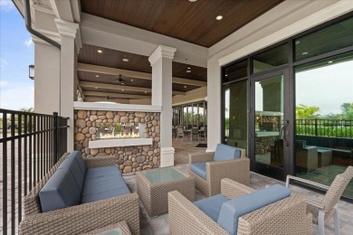 GROUND FLOOR, END UNIT, 3-bedroom, 2 bathroom condominium with on Lakewood National Golf Club in Florida - for sale on GolfHomes.com, golf home, golf lot