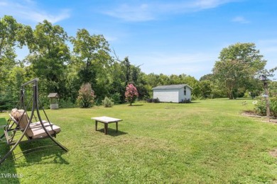 Experience the perfect blend of comfort and functionality in on Silver Lake Golf Course in Tennessee - for sale on GolfHomes.com, golf home, golf lot