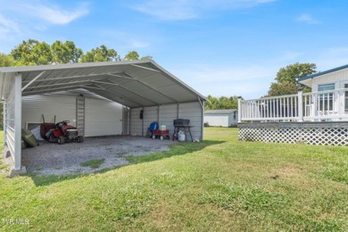 Experience the perfect blend of comfort and functionality in on Silver Lake Golf Course in Tennessee - for sale on GolfHomes.com, golf home, golf lot