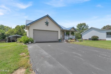 Experience the perfect blend of comfort and functionality in on Silver Lake Golf Course in Tennessee - for sale on GolfHomes.com, golf home, golf lot