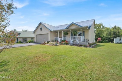 Experience the perfect blend of comfort and functionality in on Silver Lake Golf Course in Tennessee - for sale on GolfHomes.com, golf home, golf lot