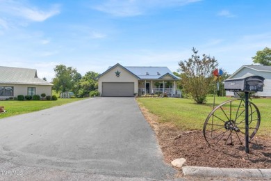 Experience the perfect blend of comfort and functionality in on Silver Lake Golf Course in Tennessee - for sale on GolfHomes.com, golf home, golf lot