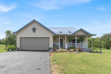 Experience the perfect blend of comfort and functionality in on Silver Lake Golf Course in Tennessee - for sale on GolfHomes.com, golf home, golf lot