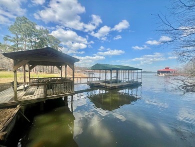 Lakeside Haven on Toledo Bend Escape to this charming 1 story on Pendleton Harbor in Texas - for sale on GolfHomes.com, golf home, golf lot