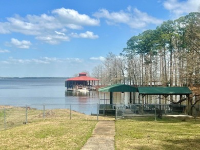 Lakeside Haven on Toledo Bend Escape to this charming 1 story on Pendleton Harbor in Texas - for sale on GolfHomes.com, golf home, golf lot
