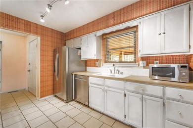 Nestled in the desirable Bella Vista community, this charming 2 on Bella Vista - Metfield Golf Complex and Country Club in Arkansas - for sale on GolfHomes.com, golf home, golf lot