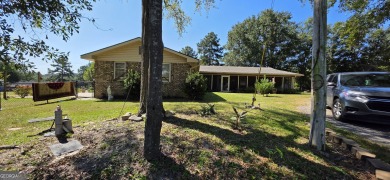 Welcome to 51 Play Golf Drive - a rare retreat just outside the on The International City Golf Course in Georgia - for sale on GolfHomes.com, golf home, golf lot