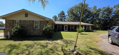 Welcome to 51 Play Golf Drive - a rare retreat just outside the on The International City Golf Course in Georgia - for sale on GolfHomes.com, golf home, golf lot