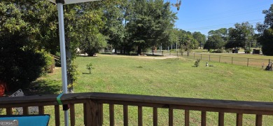 Welcome to 51 Play Golf Drive - a rare retreat just outside the on The International City Golf Course in Georgia - for sale on GolfHomes.com, golf home, golf lot