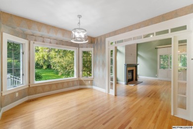 Nestled on over an acre on a scenic private drive, this on Highland Park Golf Course in Iowa - for sale on GolfHomes.com, golf home, golf lot