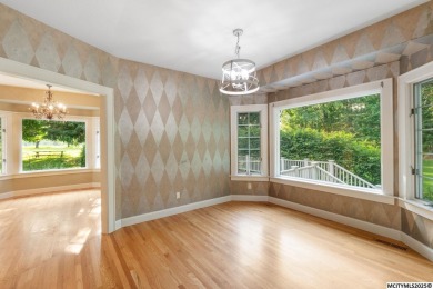 Nestled on over an acre on a scenic private drive, this on Highland Park Golf Course in Iowa - for sale on GolfHomes.com, golf home, golf lot