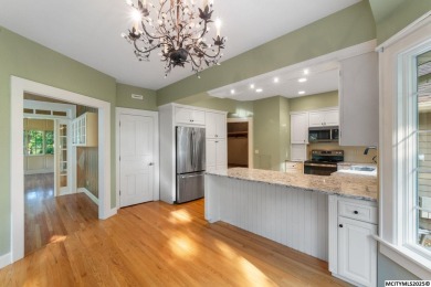 Nestled on over an acre on a scenic private drive, this on Highland Park Golf Course in Iowa - for sale on GolfHomes.com, golf home, golf lot