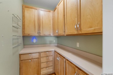 Nestled on over an acre on a scenic private drive, this on Highland Park Golf Course in Iowa - for sale on GolfHomes.com, golf home, golf lot