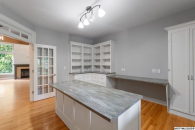 Nestled on over an acre on a scenic private drive, this on Highland Park Golf Course in Iowa - for sale on GolfHomes.com, golf home, golf lot