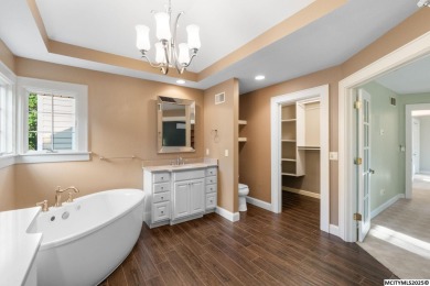 Nestled on over an acre on a scenic private drive, this on Highland Park Golf Course in Iowa - for sale on GolfHomes.com, golf home, golf lot