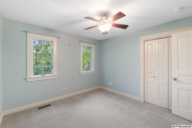 Nestled on over an acre on a scenic private drive, this on Highland Park Golf Course in Iowa - for sale on GolfHomes.com, golf home, golf lot