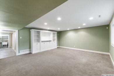 Nestled on over an acre on a scenic private drive, this on Highland Park Golf Course in Iowa - for sale on GolfHomes.com, golf home, golf lot