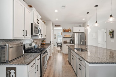 Discover this stunning 5-bedroom, 3.5-bath home in the highly on The Club at Pine Forest  in South Carolina - for sale on GolfHomes.com, golf home, golf lot