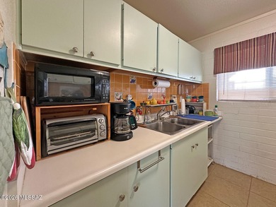Beautifully updated downstairs unit in Central Tucson featuring on Randolph Park Golf Courses in Arizona - for sale on GolfHomes.com, golf home, golf lot