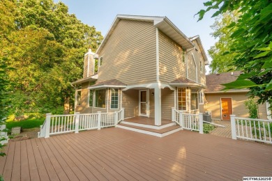 Nestled on over an acre on a scenic private drive, this on Highland Park Golf Course in Iowa - for sale on GolfHomes.com, golf home, golf lot