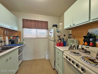 Beautifully updated downstairs unit in Central Tucson featuring on Randolph Park Golf Courses in Arizona - for sale on GolfHomes.com, golf home, golf lot